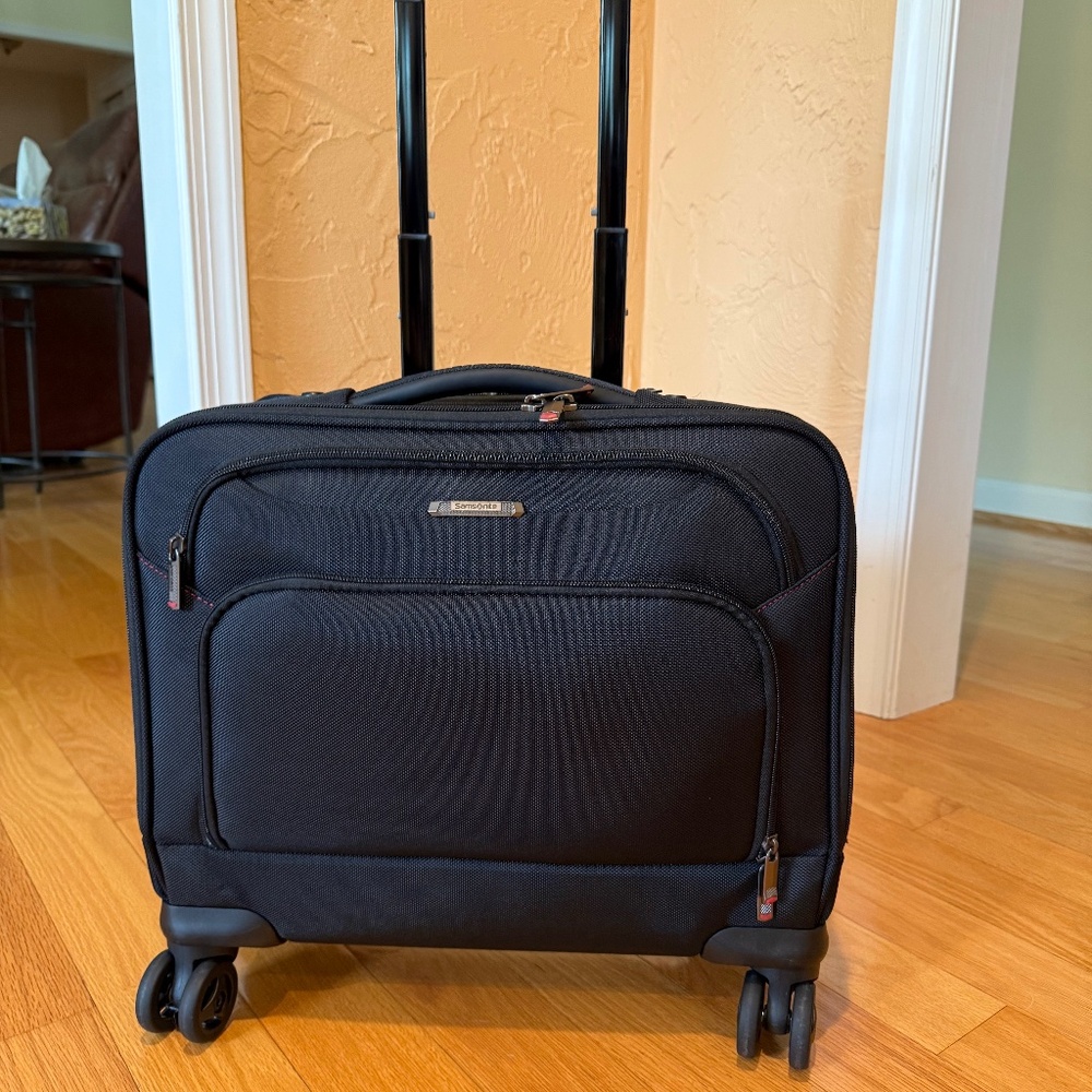 Black Samsonite computer work travel bag.